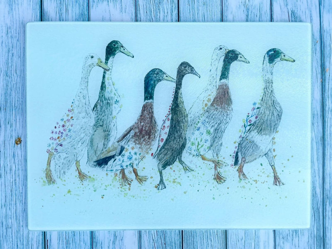 DUCKS IN A ROW CHOPPING BOARD