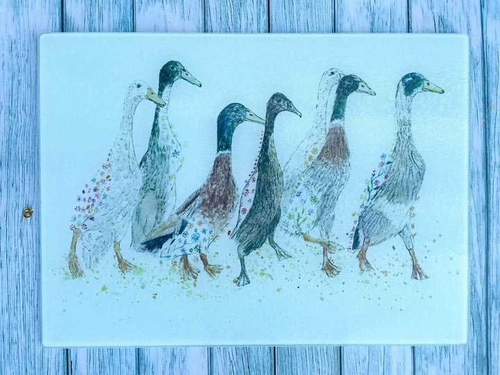 DUCKS IN A ROW CHOPPING BOARD