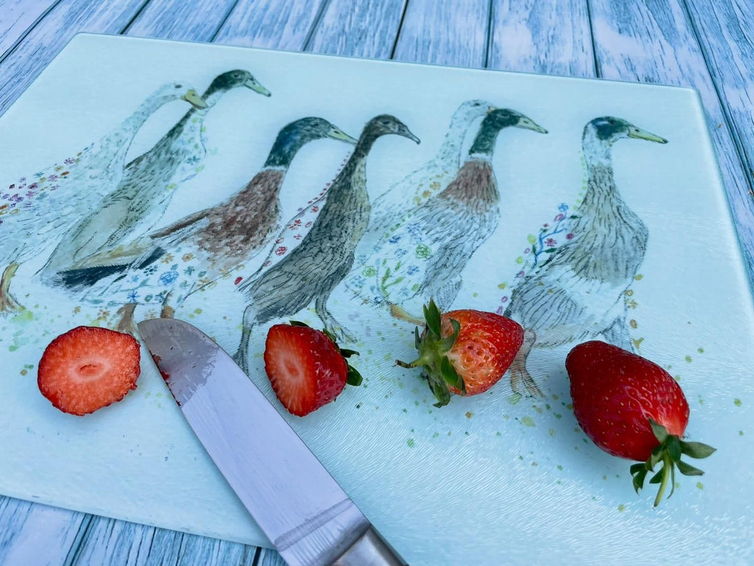 DUCKS IN A ROW CHOPPING BOARD
