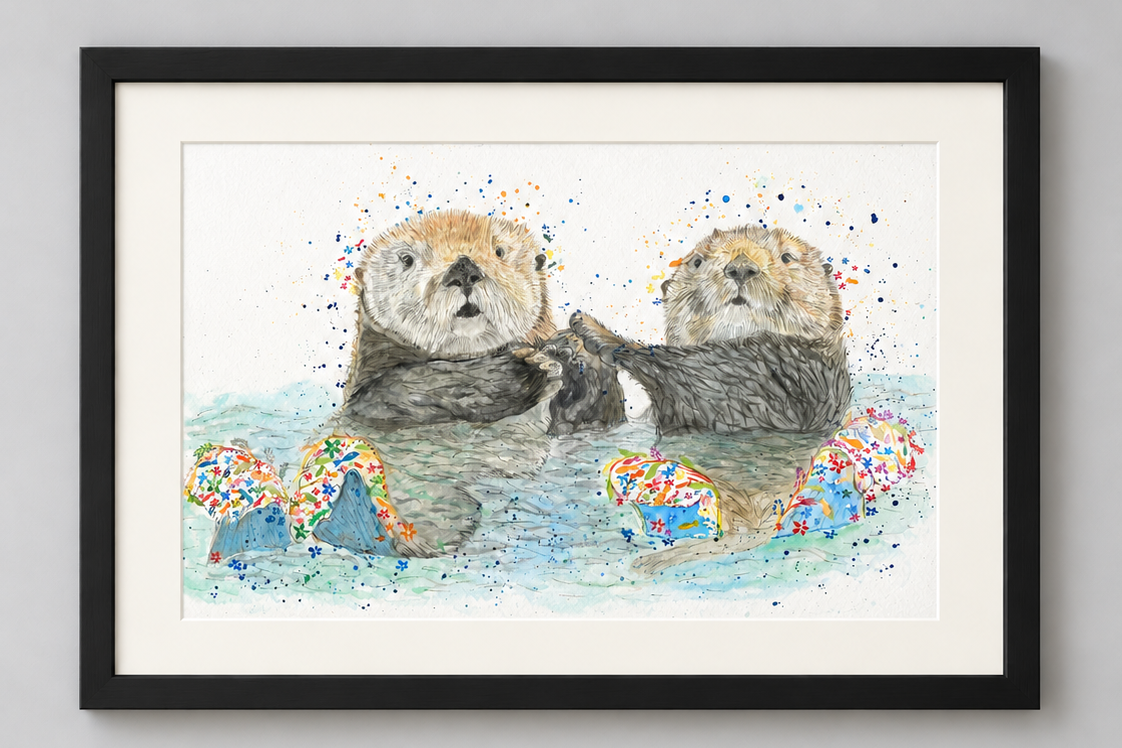 Otis and Opal the Otters signed print in black landscape frame on portrait-shaped neutral wall background